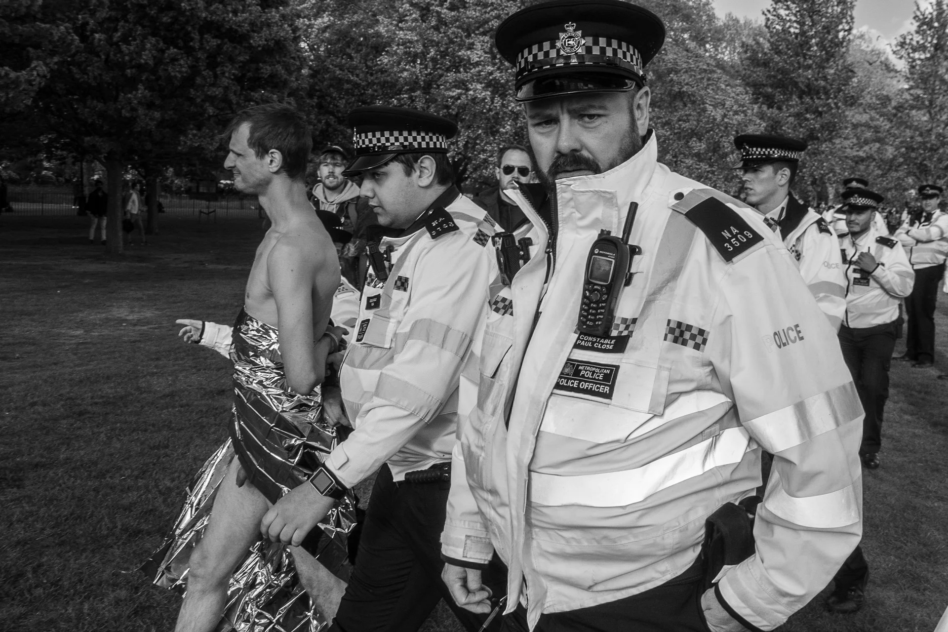 First Extinction Rebellion protest in London, 2019 - Police arresting a naked protester - Luv - Vincenzo Lullo | Documentary Photography