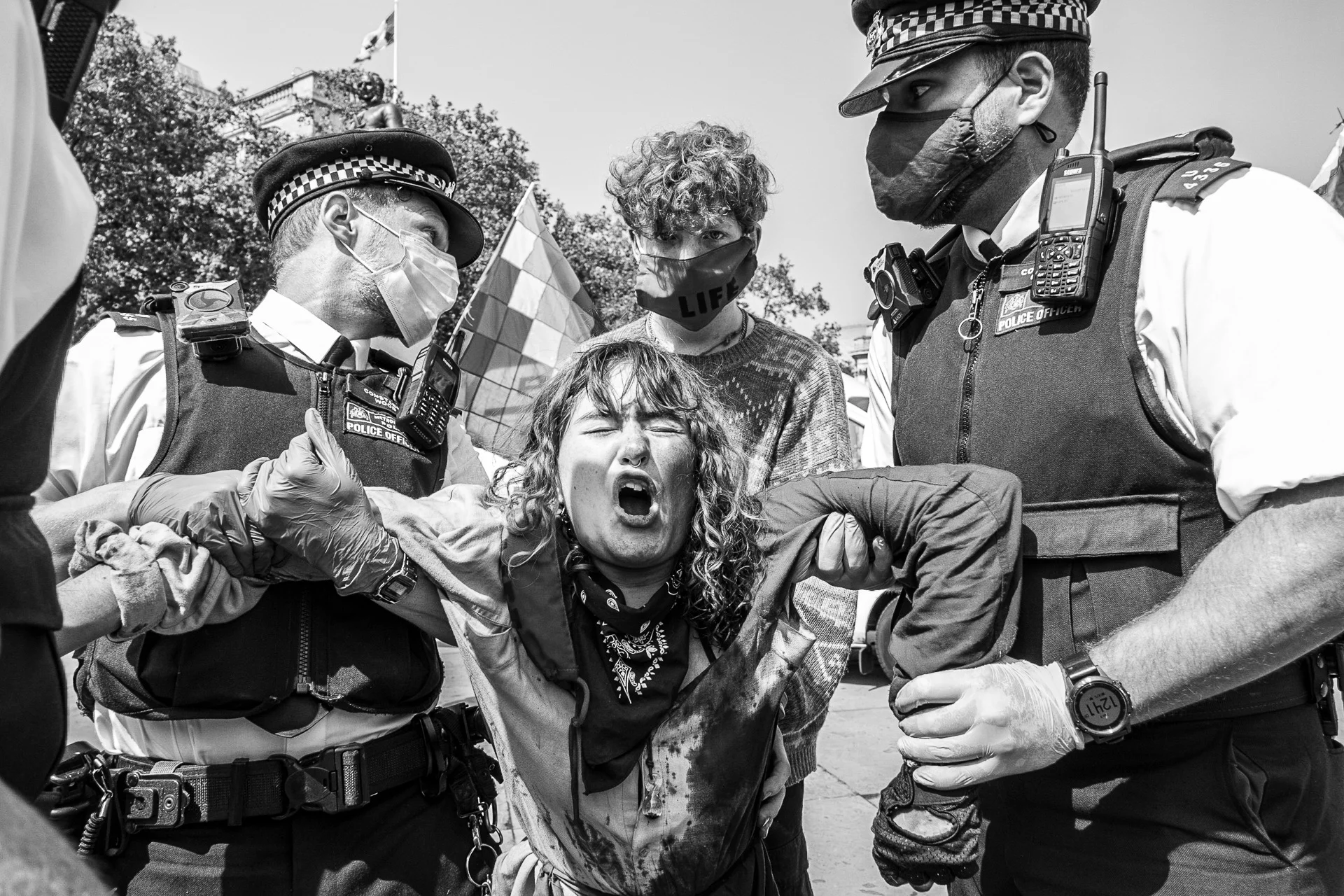A young woman being arrested during an Extinction Rebellion protest in London, 2020 - Luv - Vincenzo Lullo | Documentary Photography