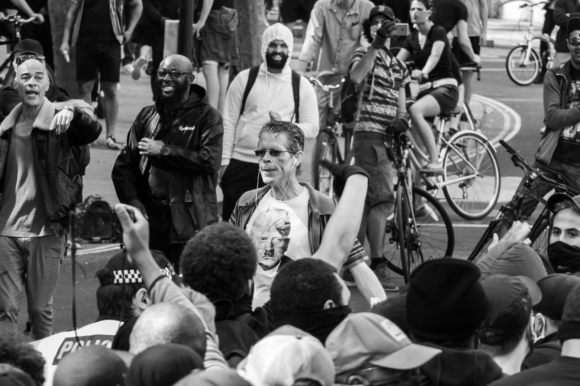 Far Right member with provocative t-shirt with Hitler and Trump - Photo documentary | Leica V-Lux | 400mm f/8.0 | 1/125s | ISO 125
